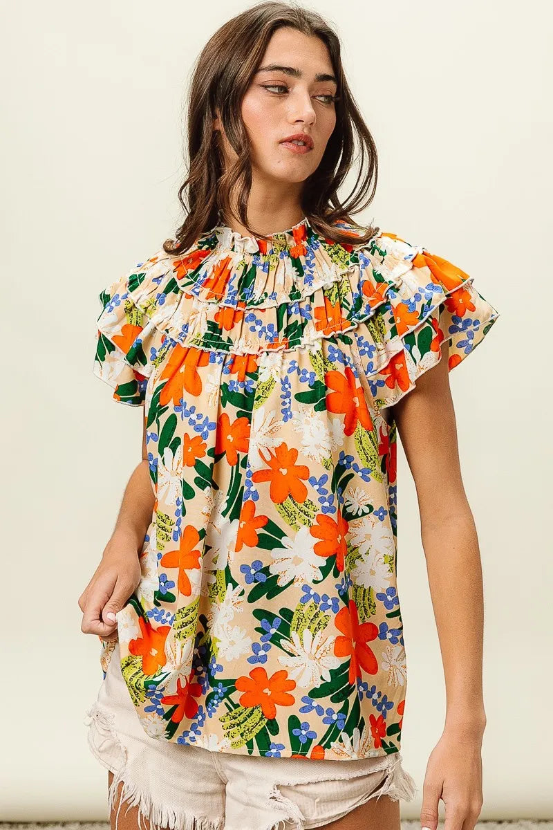 Multi-color floral print woven top by Trendsi, featuring a stylish design and vibrant pattern.