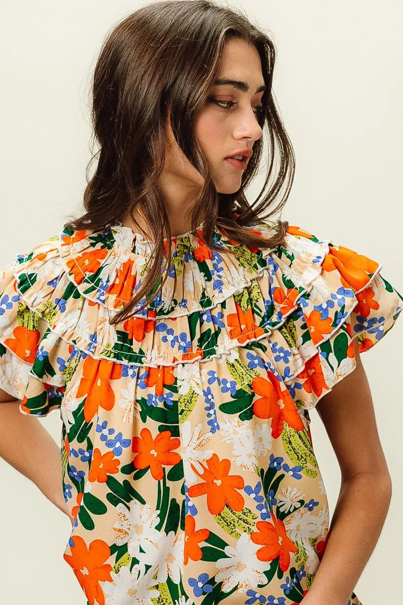 Multi-color floral print woven top from BiBi by Trendsi, featuring a feminine design and lightweight fabric.