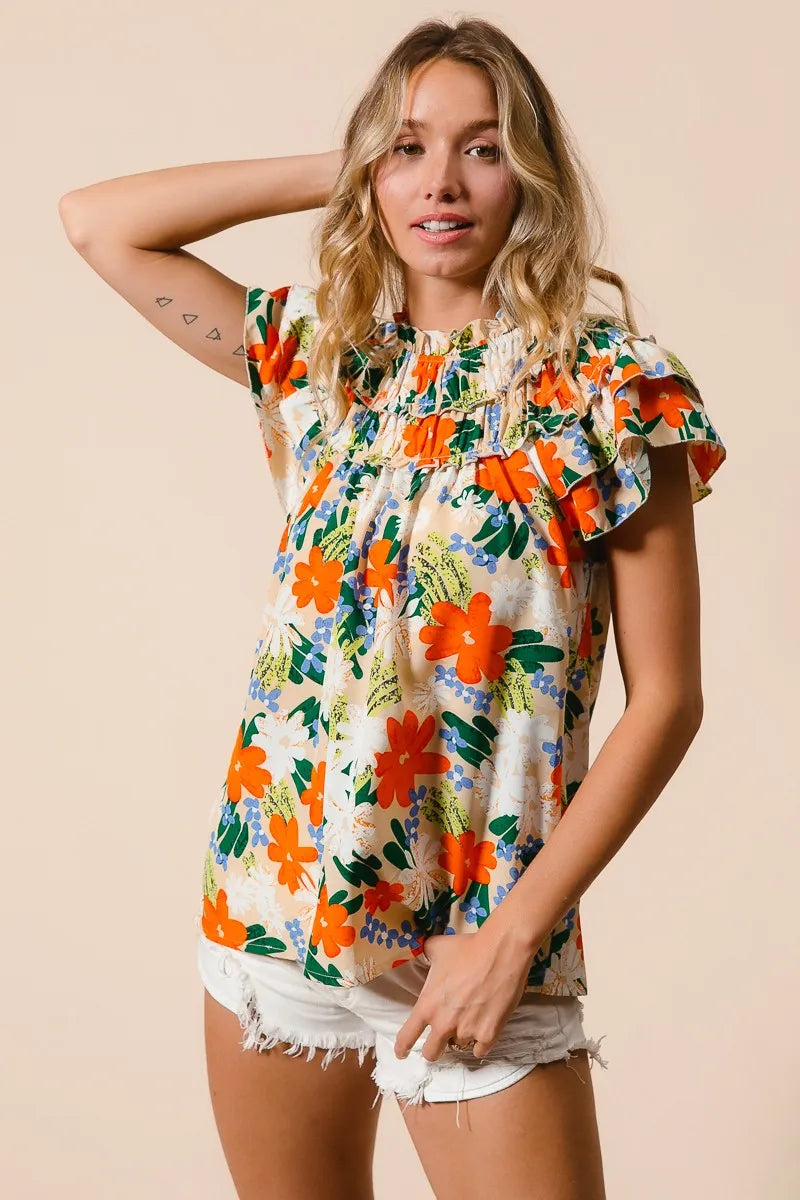 Multicolor floral print woven top by Trendsi featuring a stylish design and lightweight fabric, perfect for casual wear.