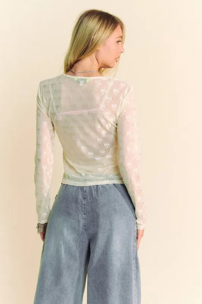 Cream Davi & Dani Bow Mesh long sleeve top with round neckline, stylish and lightweight for casual or dressy wear.