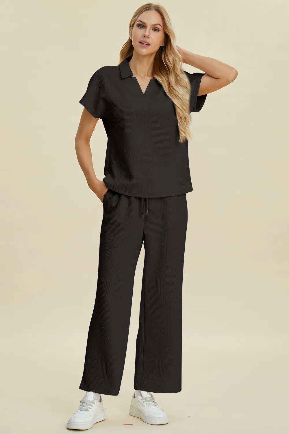 Cream-colored Trendsi Double Take full-size short sleeve top and matching pants set with a collared neckline, casual and stylish.