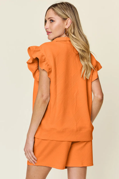 Cream-colored Trendsi double take texture flounce sleeve top and drawstring shorts set, casual and stylish for warm weather.