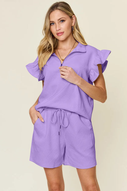 Cream-colored Trendsi Double Take full-size texture flounce sleeve top with matching drawstring shorts set, casual and stylish.