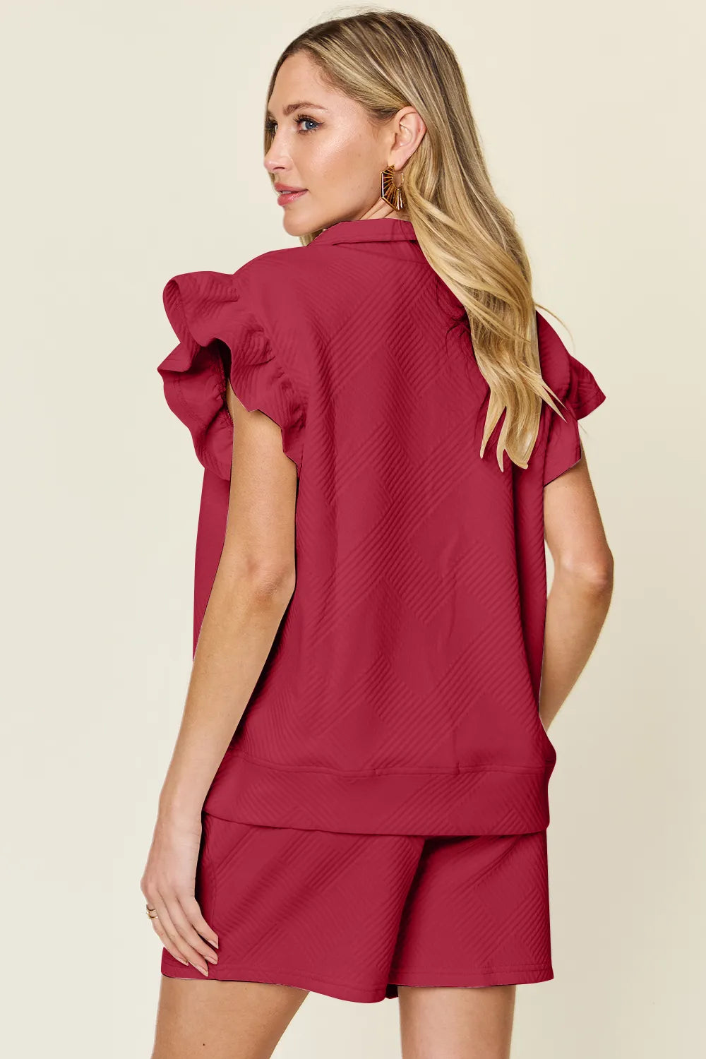 Cream-colored Trendsi double take full size texture flounce sleeve top and drawstring shorts set, casual and stylish.