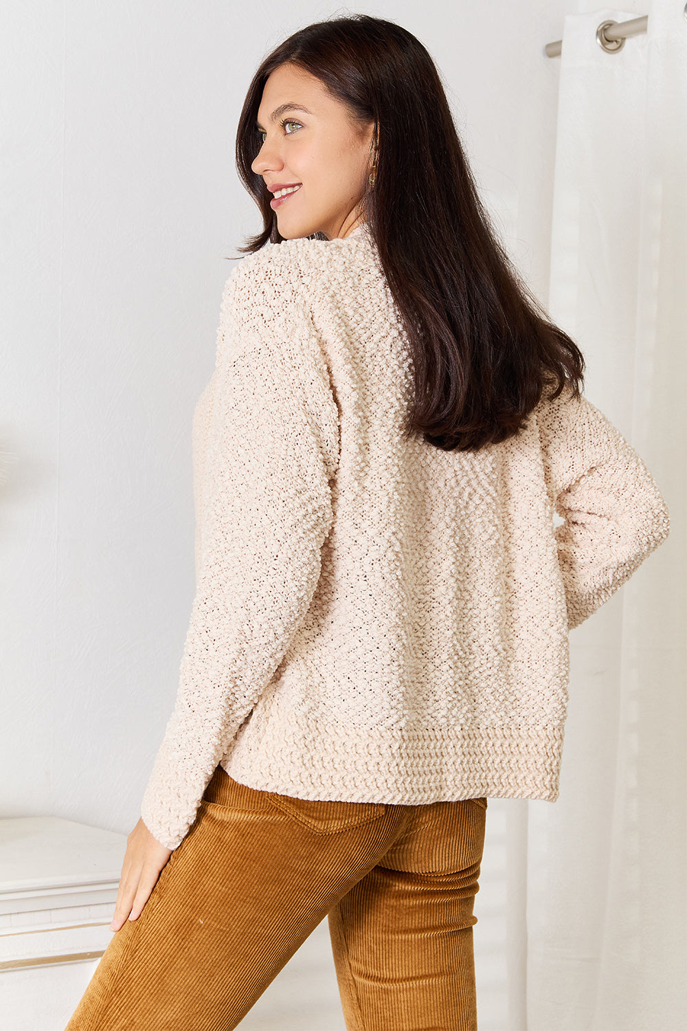 Cream open-front long sleeve cardigan from Trendsi, featuring a relaxed fit and versatile style, perfect for layering.