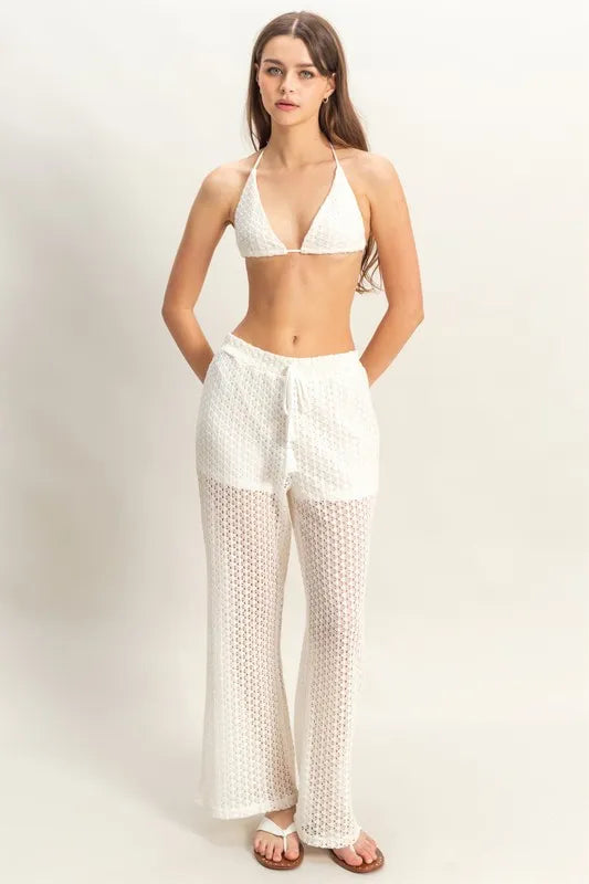 Cream crochet bra and drawstring pants set by HYFVE, styled for a casual, chic look in this Trendsi product image.