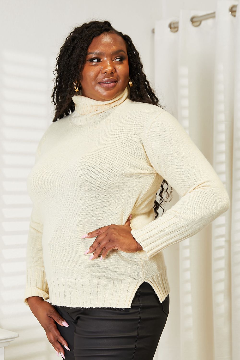 Cream Heimish long sleeve turtleneck sweater with side slit, stylish and cozy, from Trendsi, shown in size small.