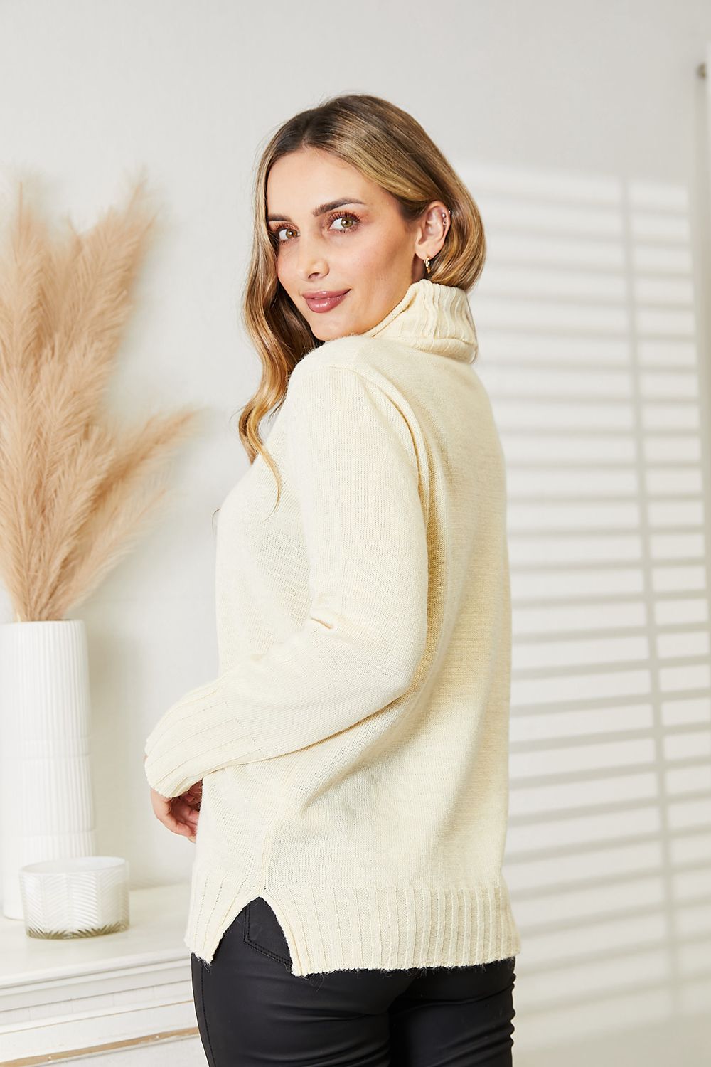 Cream Heimish long sleeve turtleneck sweater with side slit, stylish and cozy women's knit top by Trendsi.