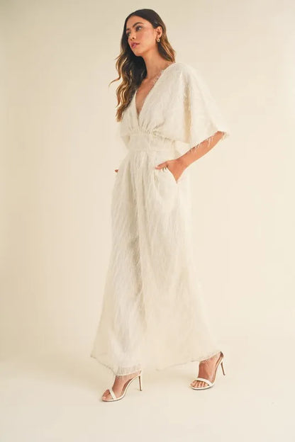 Cream MABLE Fluffy Deep V Neck Wide Leg Jumpsuit by Trendsi, featuring a soft textured fabric and stylish deep V neckline.