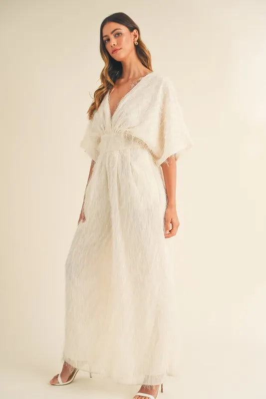 Cream MABLE Fluffy Deep V Neck Wide Leg Jumpsuit by Trendsi, featuring a cozy textured fabric and stylish deep V neckline.