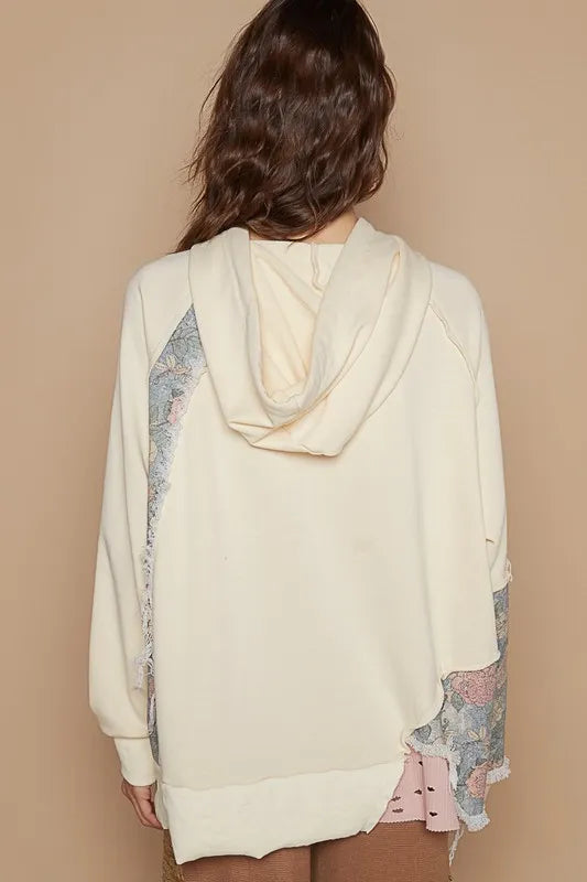 Cream floral patchwork distressed drawstring hoodie from Trendsi with casual style and cozy fabric.