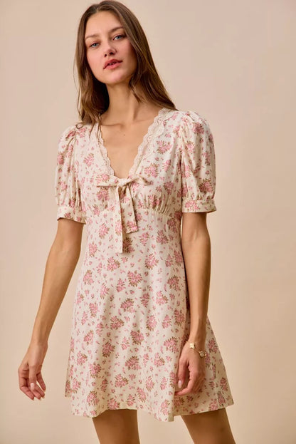 Cream floral lace-trimmed short sleeve mini dress by SO ME, trendy and elegant for casual or special occasions.