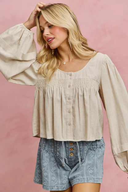 Cream linen blend woven long sleeve top with smocking detail, stylish and lightweight, from Trendsi's SO ME collection.