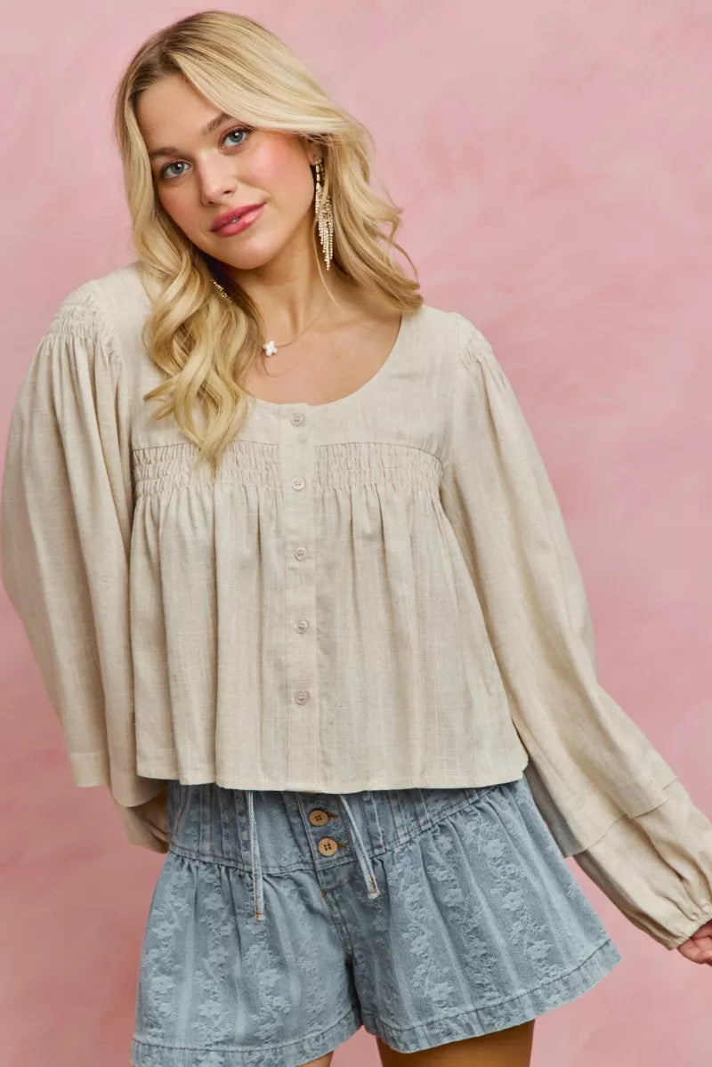 Cream linen blend woven long sleeve top with smocking detail, stylish Trendsi SO ME blouse for casual or dressy occasions.