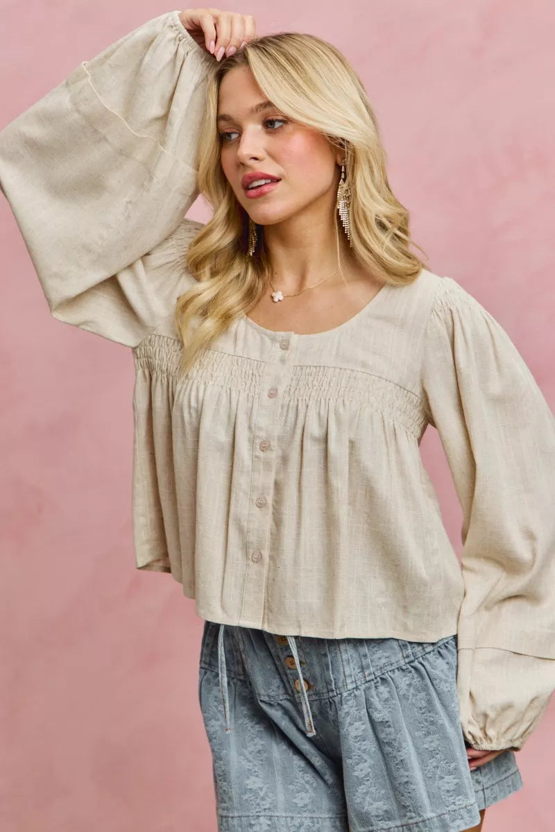 Cream linen blend woven long sleeve top with smocking detail, stylish Trendsi SO ME blouse for a casual chic look.