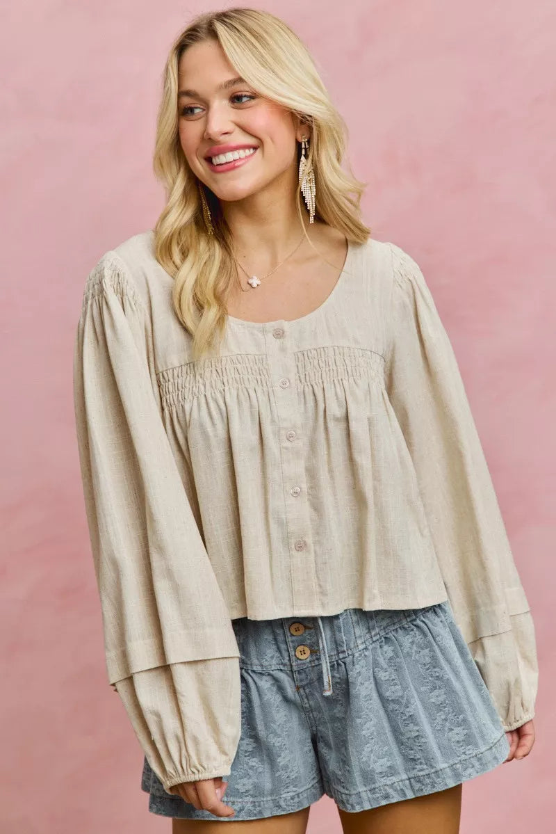 Cream linen blend woven long sleeve top with smocking detail from SO ME by Trendsi, featuring a relaxed fit and stylish design.
