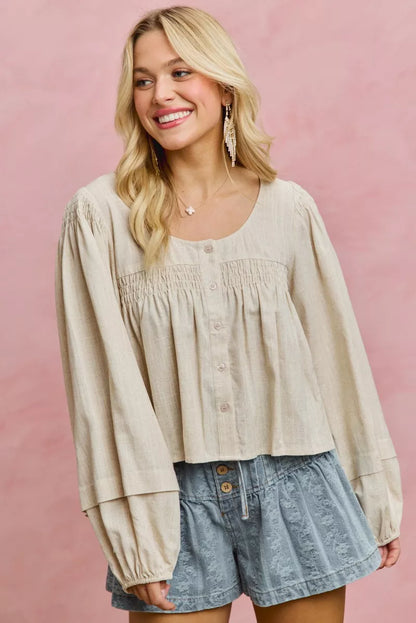 Cream linen blend woven long sleeve top with smocking detail from SO ME by Trendsi, featuring a relaxed fit and stylish design.