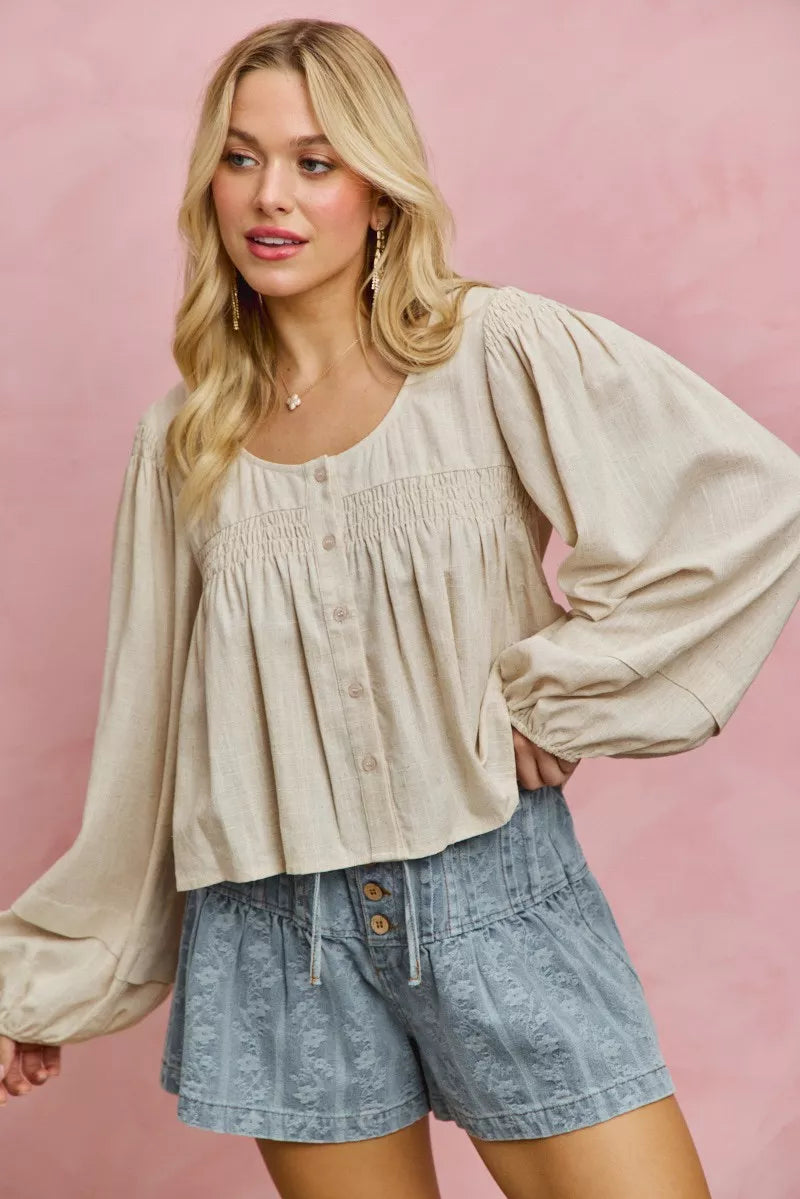 Cream linen-blend woven long sleeve top with smocking detail, stylish Trendsi women's blouse featuring a relaxed fit.