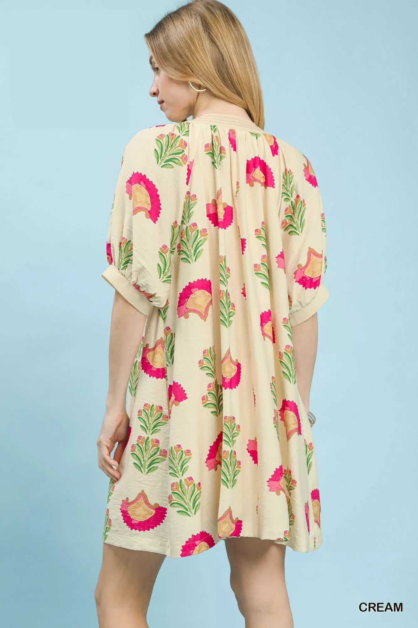 Cream Umgee abstract print mini dress by Trendsi featuring a stylish, flowy design with short sleeves and a flattering silhouette.