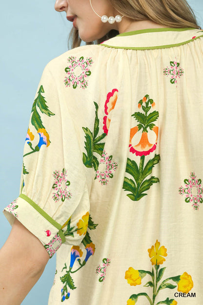 Cream Umgee botanical print contrast trim button blouse with long sleeves and relaxed fit, stylish and lightweight.