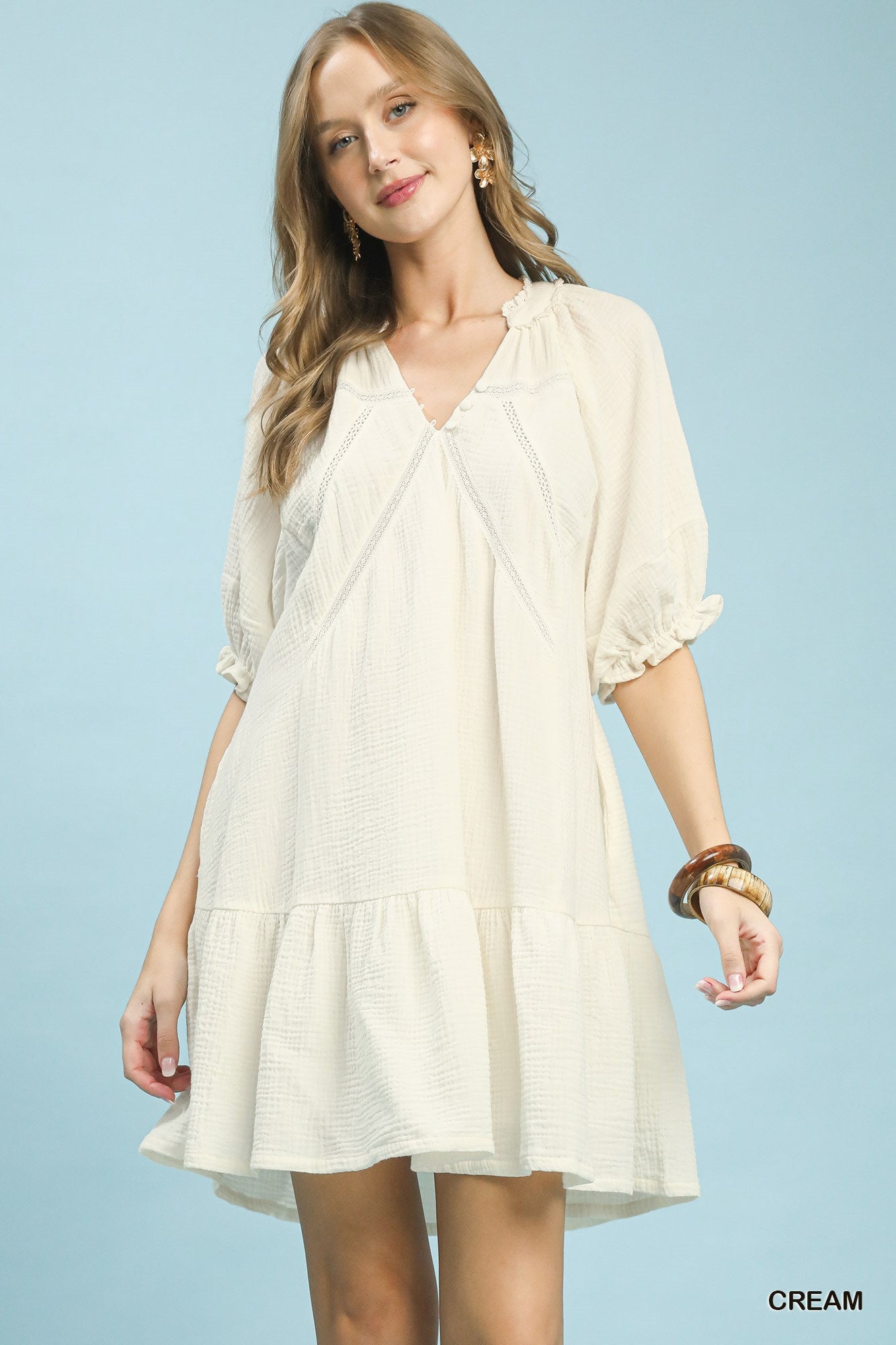 Cream Umgee Cotton Gauze Mini Dress with short sleeves and relaxed fit, styled for casual summer wear.