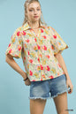 Cream floral print Umgee button-down blouse with flutter sleeves, featuring a relaxed fit and feminine style.