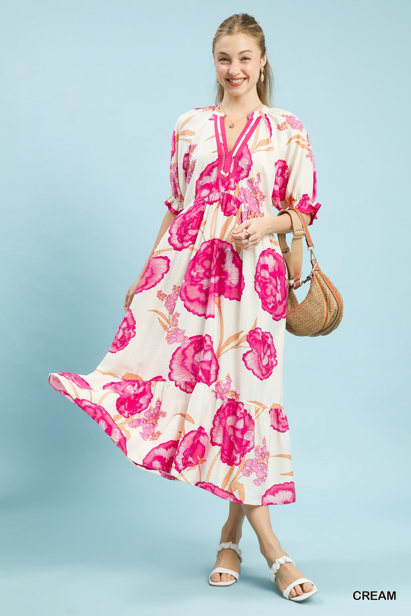 Cream floral print midi dress with contrast trim by Umgee, featuring a flowy silhouette and stylish design.