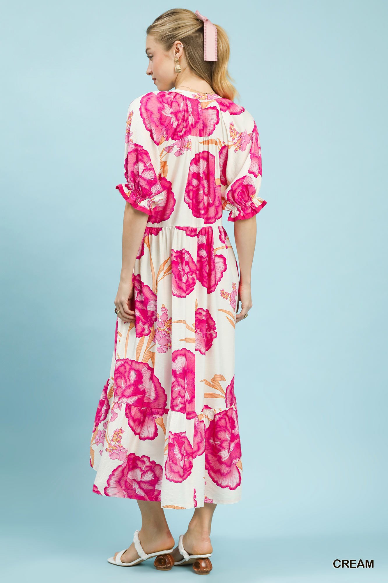 Cream floral print midi dress by Umgee with contrast trim, featuring a flowy silhouette and feminine design.