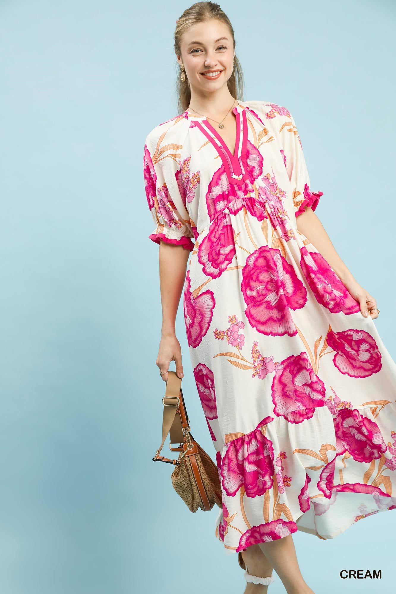 Cream floral print midi dress with contrast trim by Umgee, featuring a relaxed fit and feminine design.