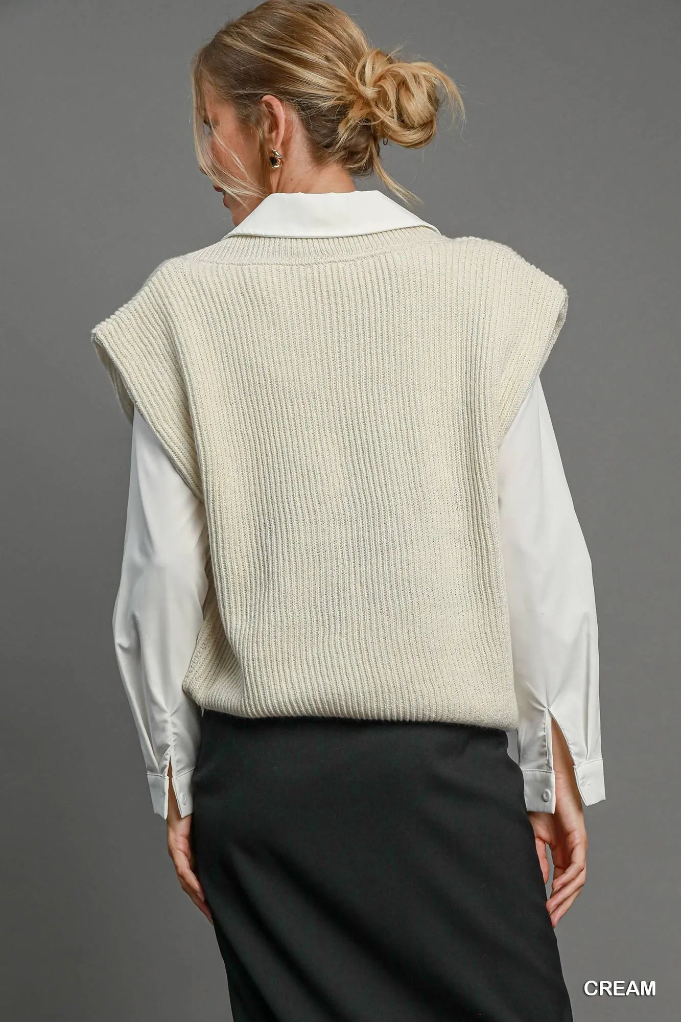 Cream oversized V-neck vest by Umgee, featuring a relaxed fit and soft knit fabric, styled with casual layering.