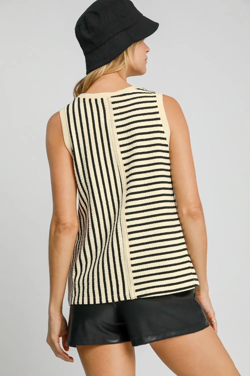 Cream Umgee round neck striped tank top with textured fabric, featuring a relaxed fit and subtle horizontal stripe pattern.