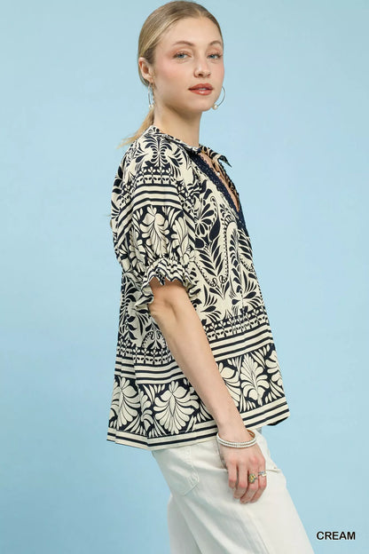 Cream Umgee two-tone border print top with long sleeves and relaxed fit, stylish casual women's blouse.
