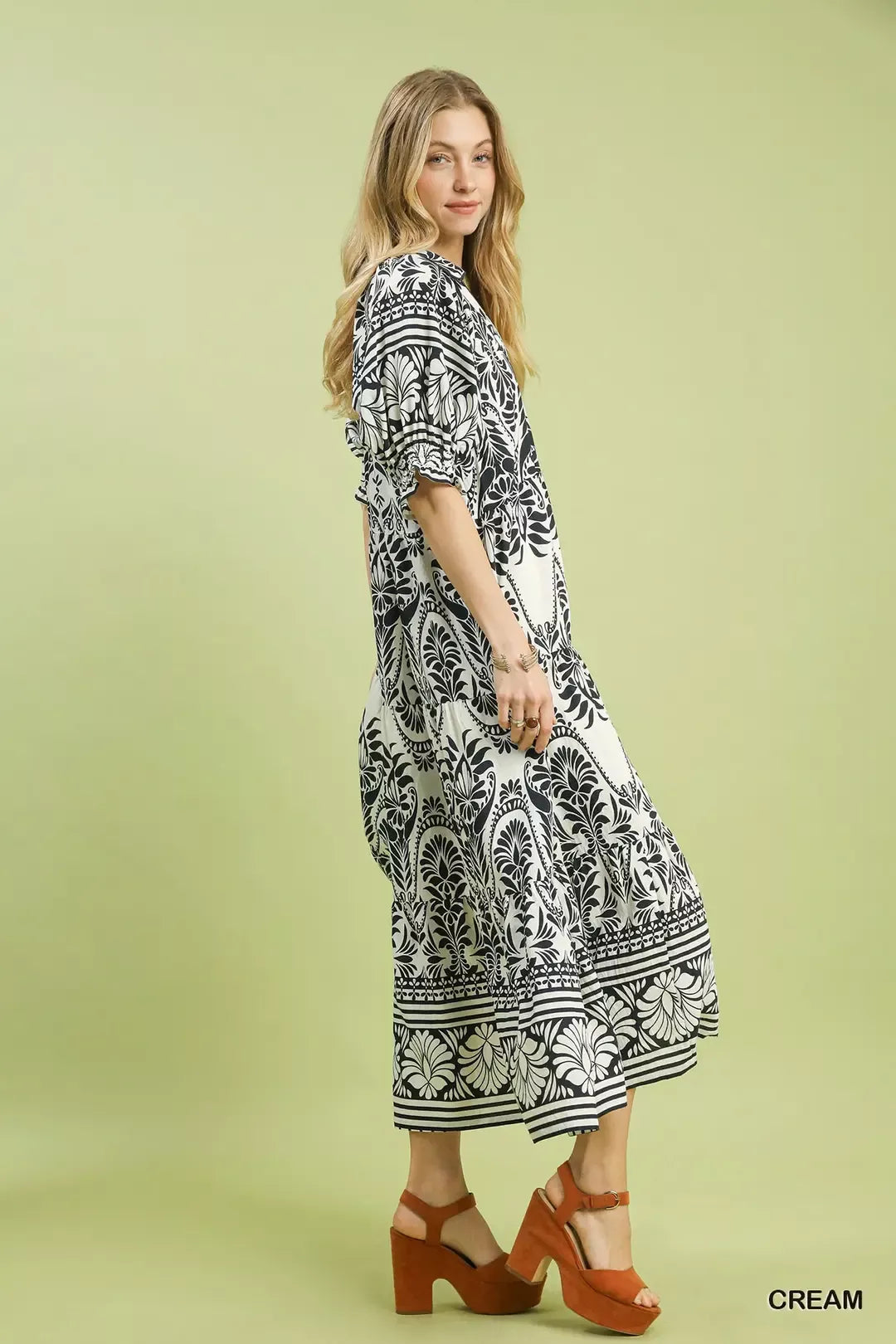 Cream two-tone border print midi dress by Umgee featuring a flowing silhouette and stylish pattern.