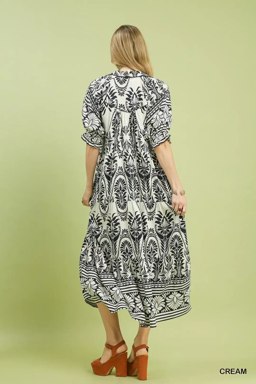 Cream Umgee two-tone border print midi dress with short sleeves and relaxed fit, perfect for casual and semi-formal occasions.