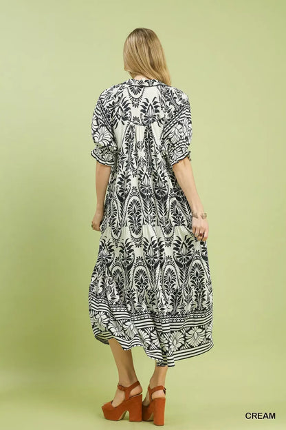 Cream Umgee two-tone border print midi dress with short sleeves and relaxed fit, perfect for casual and semi-formal occasions.