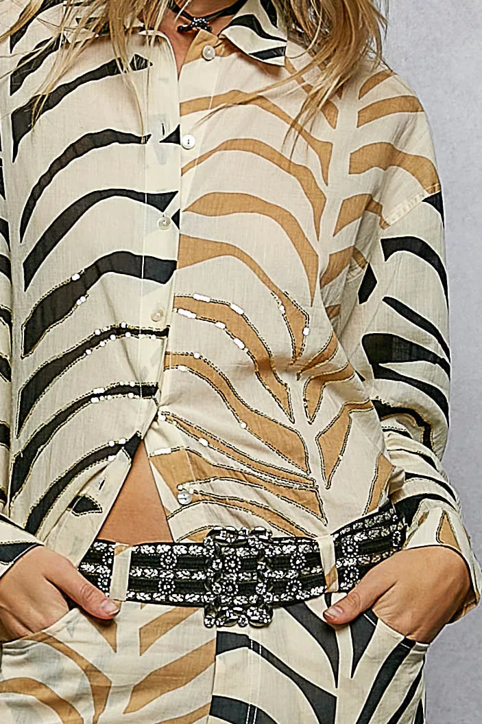 Cream and zebra-print two-tone woven long sleeve shirt with spangles from Trendsi, featuring a stylish printed design.