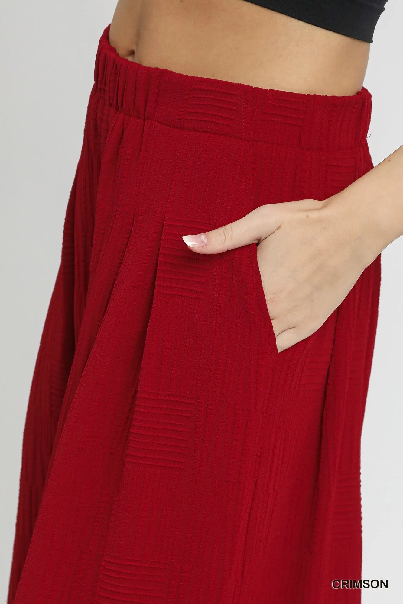 Crimson Umgee elastic waist wide leg pants with relaxed fit and flowy fabric, styled for casual or chic look.
