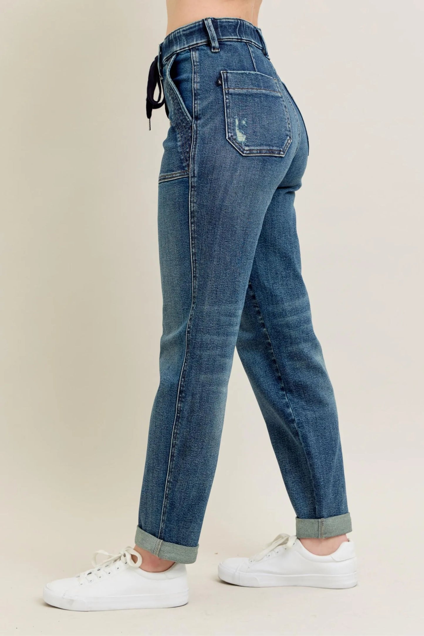 Judy Blue full-size vintage wash jeans with drawstring detail, plus size, featuring classic denim texture and casual fit.