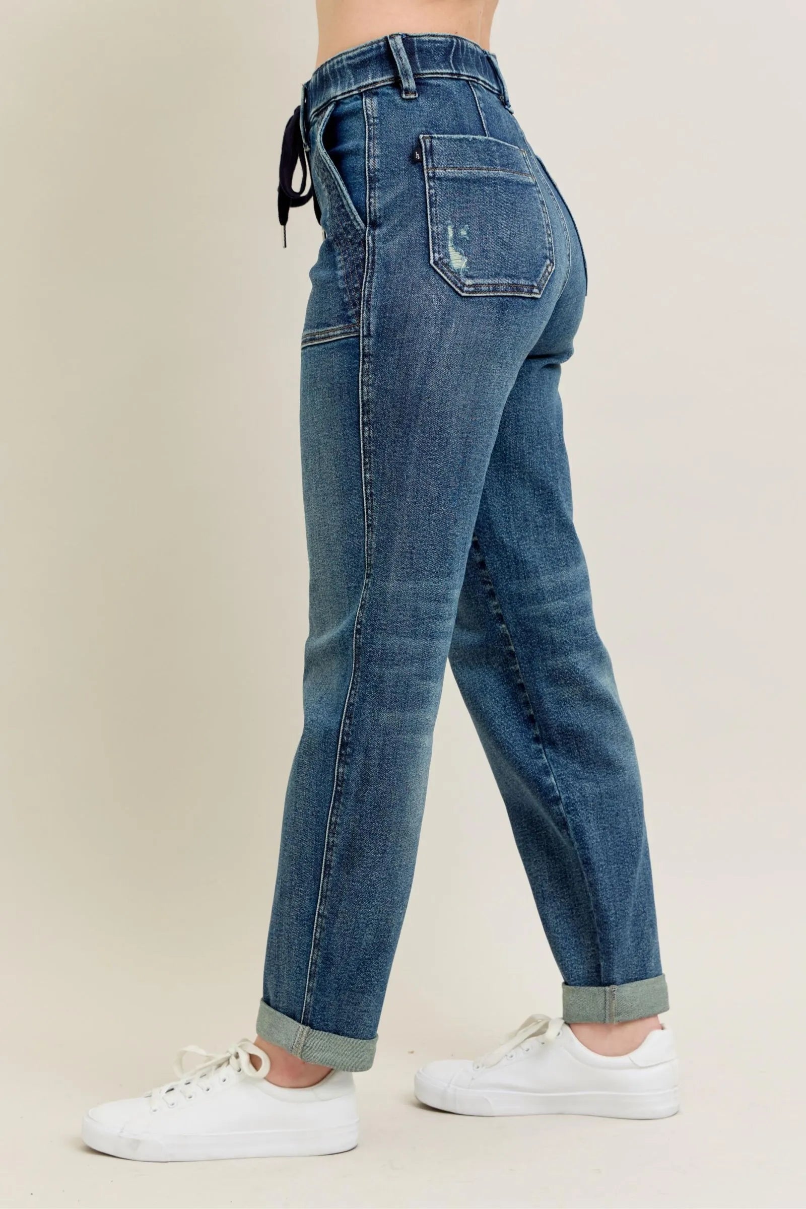 Judy Blue full-size vintage wash jeans with drawstring detail, plus size, featuring classic denim texture and casual fit.