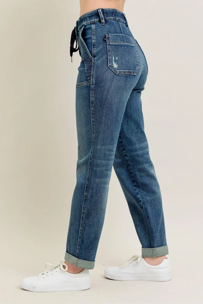 Judy Blue full-size vintage wash jeans with drawstring detail, plus size, featuring classic denim texture and casual fit.