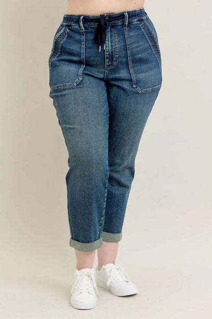 Dark wash Judy Blue full-size vintage wash jeans with drawstring and plus size fit, featuring classic denim styling.