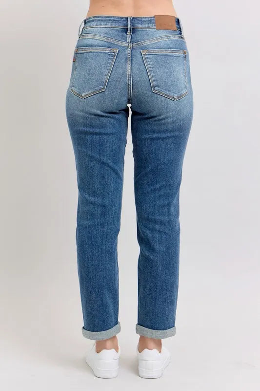 Dark wash Judy Blue full-size mid-rise skinny cuff jeans with pockets, designed for plus size, by Trendsi.