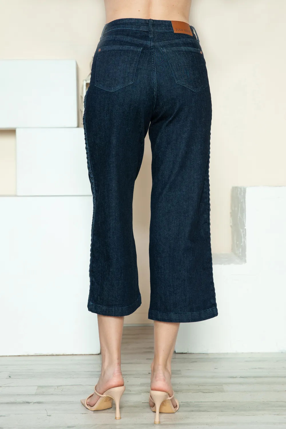 Dark Judy Blue crop wide-leg jeans with side seam braid detail, full size, featuring a stylish, relaxed fit and trendy design.