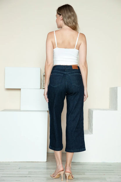 Dark Judy Blue wide-leg crop jeans with side seam braid detail, featuring a full-size fit and stylish design.