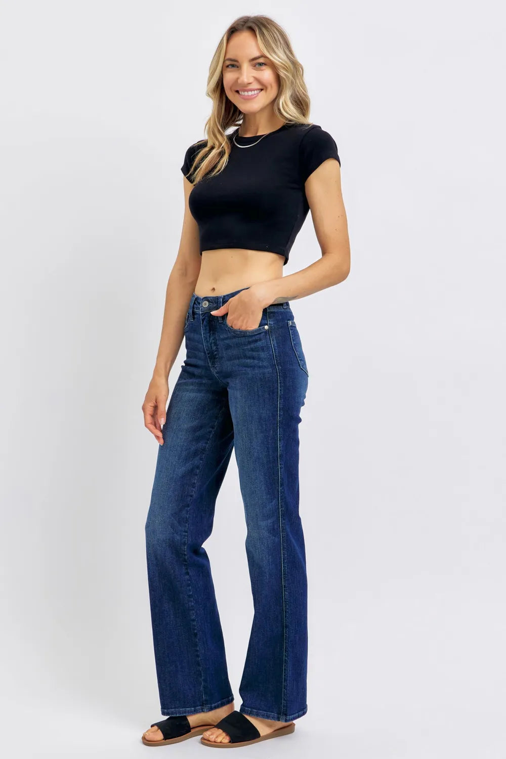 Dark wash Judy Blue full size tummy control straight jeans for plus size women, showcasing a comfortable fit and classic denim style.