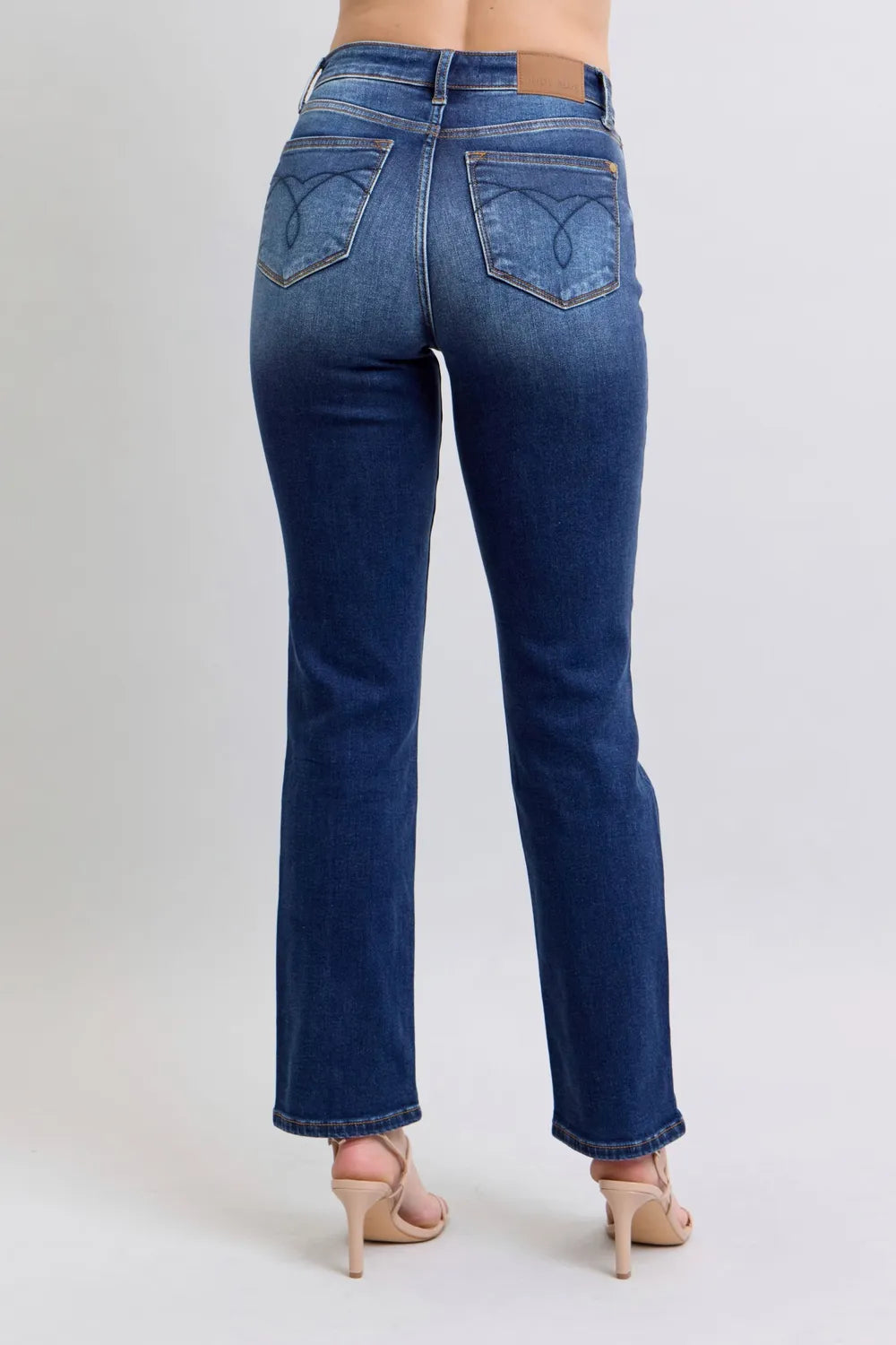 Dark wash Judy Blue full-size straight leg jeans with front and back pockets, featuring a washed finish.