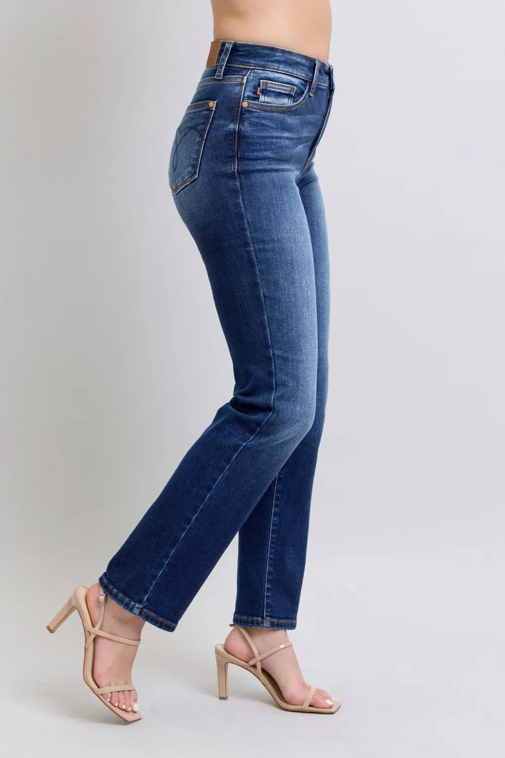 Dark washed Judy Blue full-size straight-leg jeans with pockets, displayed on a model showcasing their fit and style.