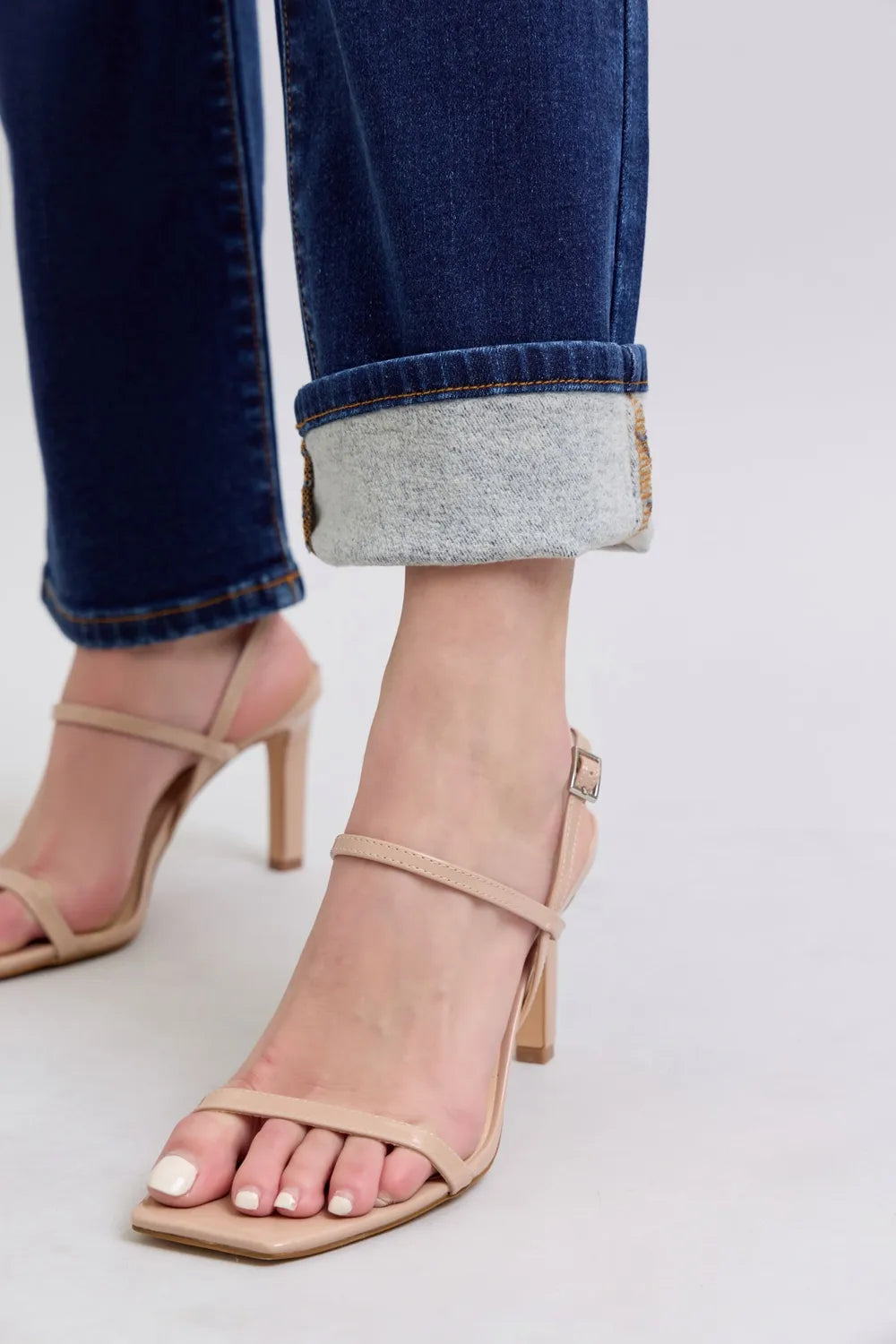 Dark wash Judy Blue full-size straight leg jeans with pockets, showcasing casual denim style and classic fit.