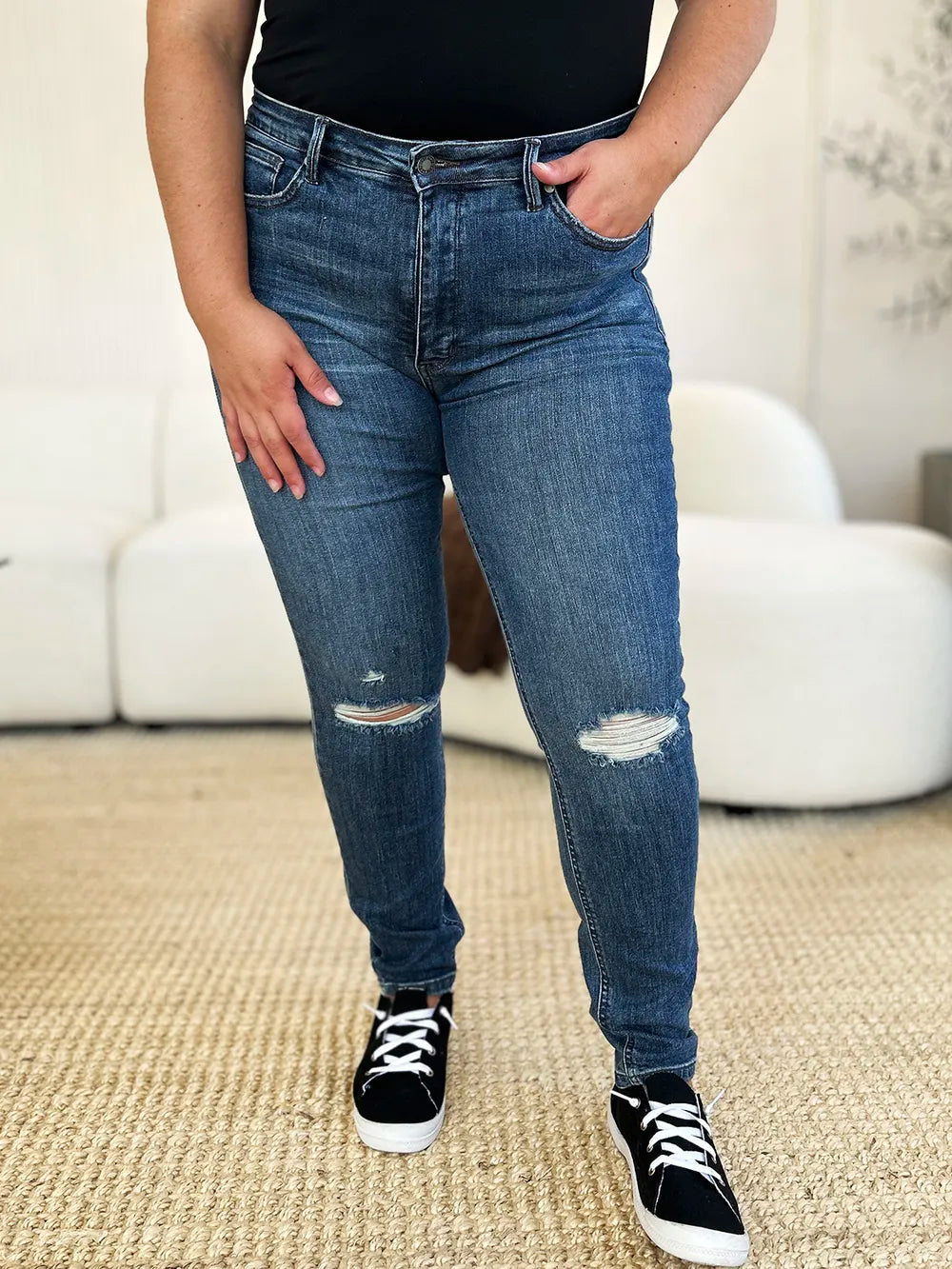 Dark Judy Blue full-size mid-waist distressed slim jeans, showcasing a fitted silhouette and distressed details.