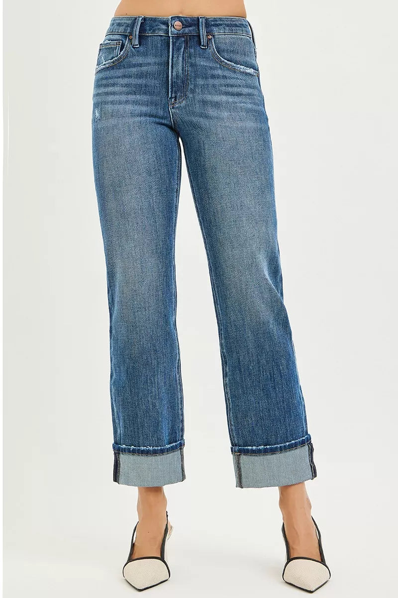Dark plus size RISEN full size 4-way stretch slouchy straight jeans with cuffed hem, by Trendsi, shown on a model.